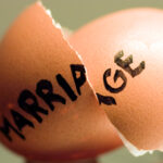 Broken egg shell with the word marriage 